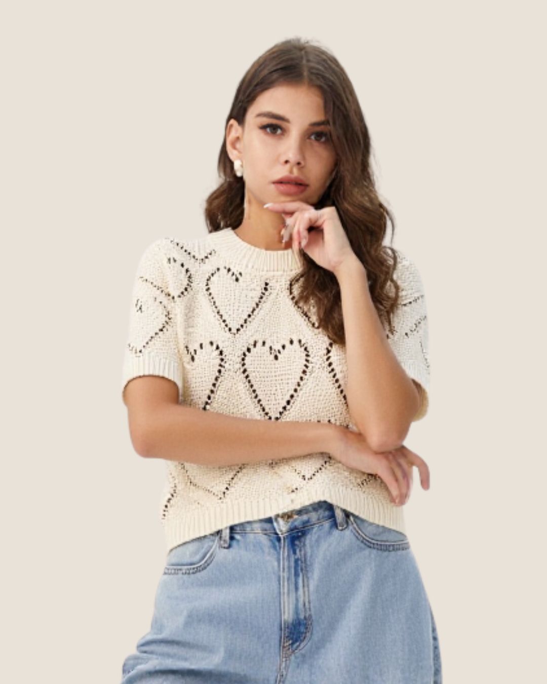 Blusa tejida de corazones beige