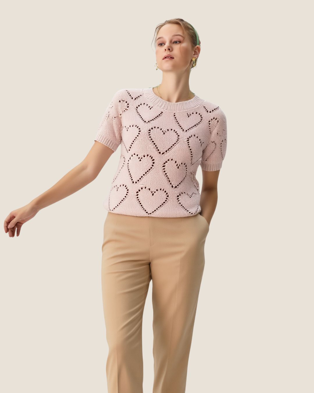 Blusa tejida de corazones palo rosa
