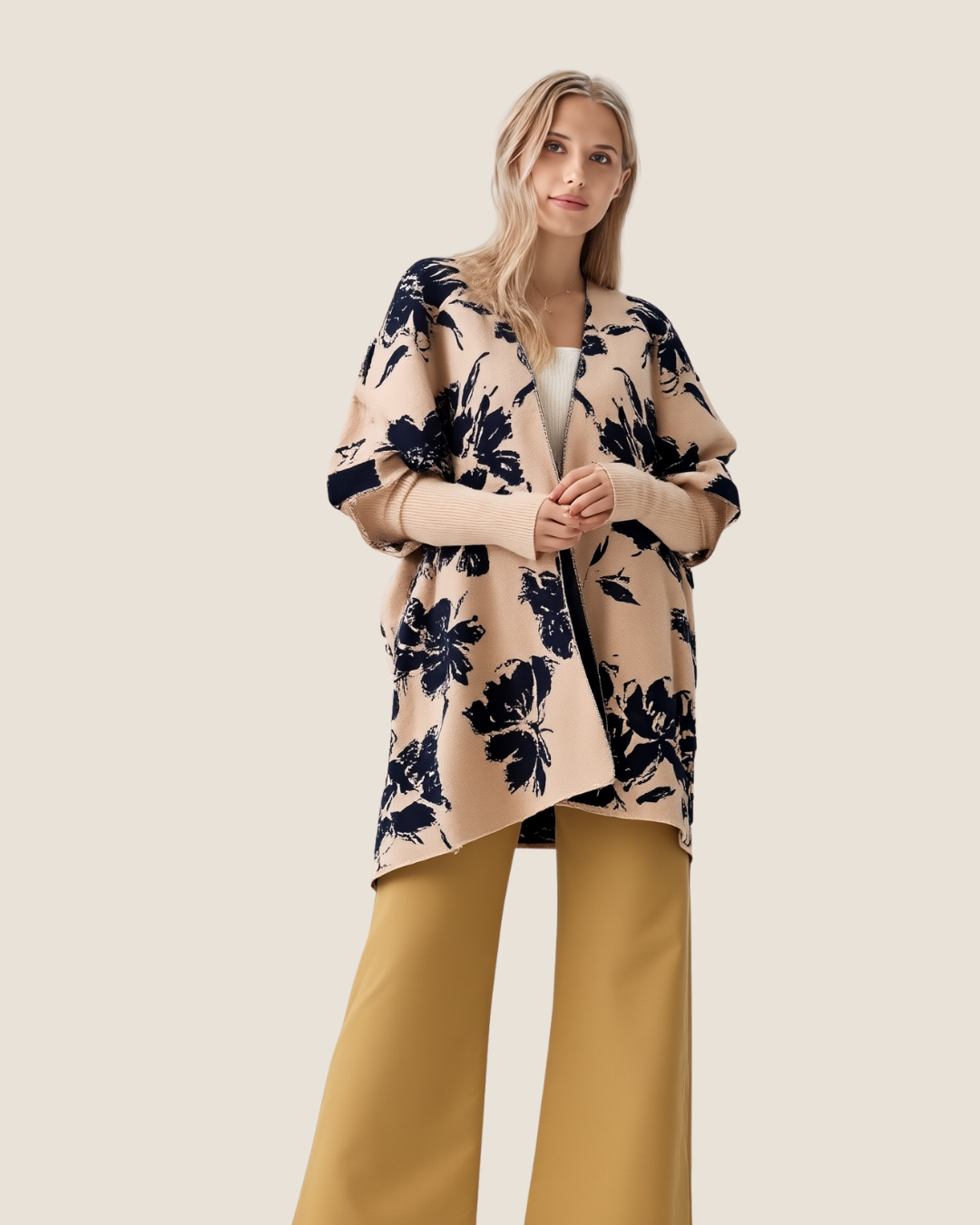 Poncho floral crema