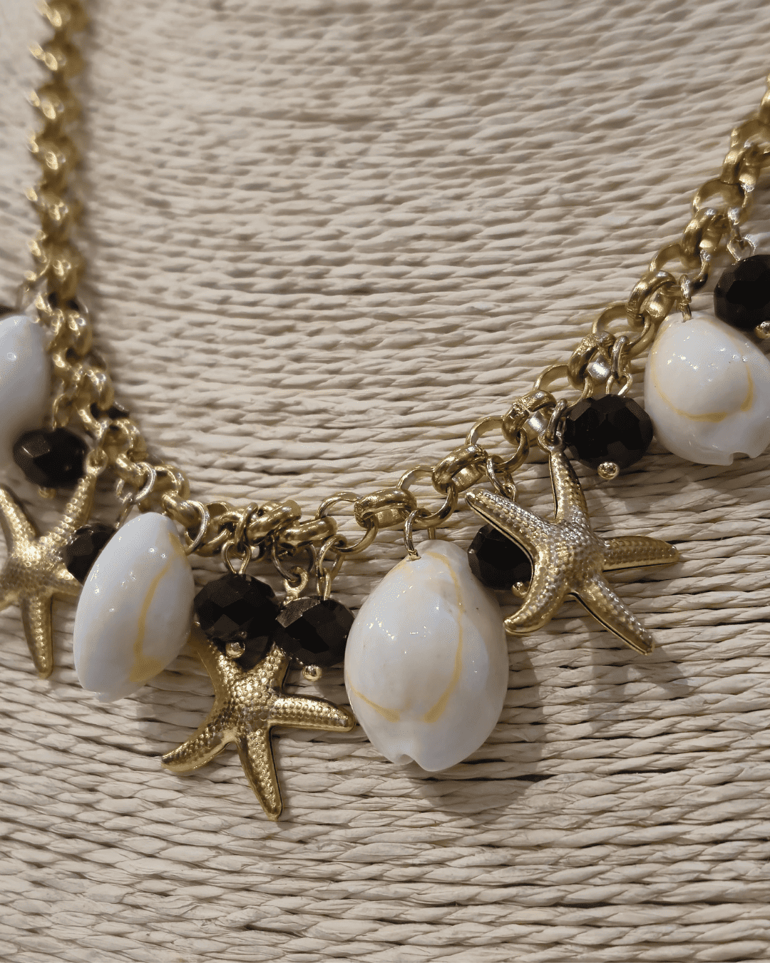 Collar de dijes de playa