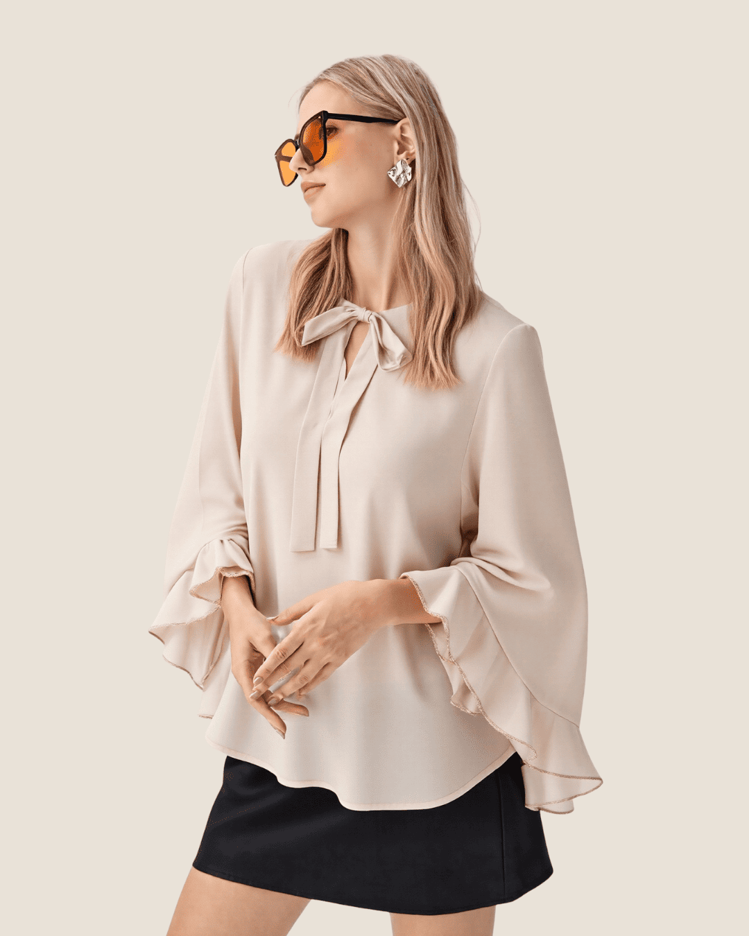 Blusa de mangas acampanadas