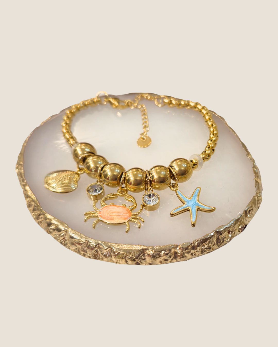 Pulsera con dijes marinos
