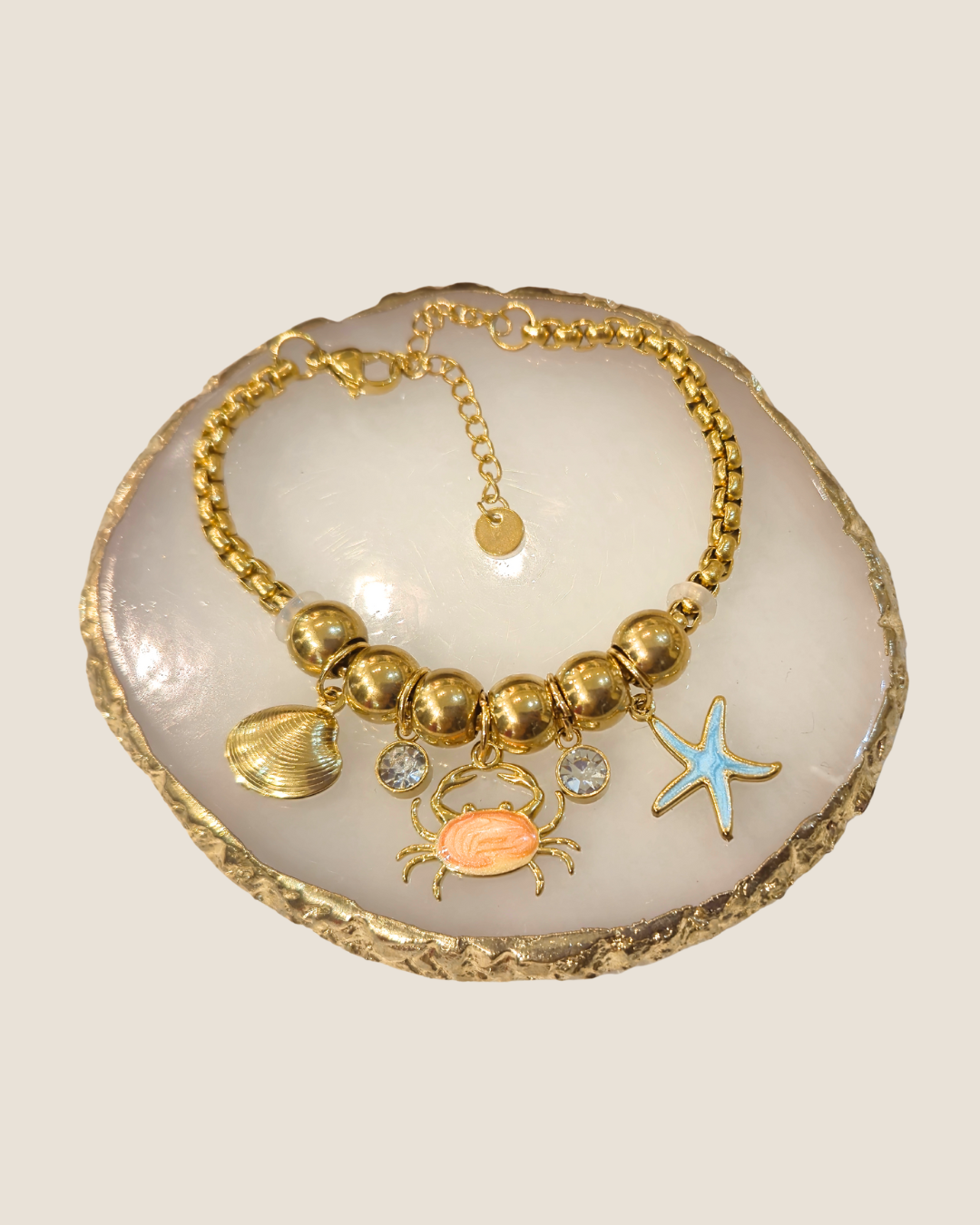 Pulsera con dijes marinos