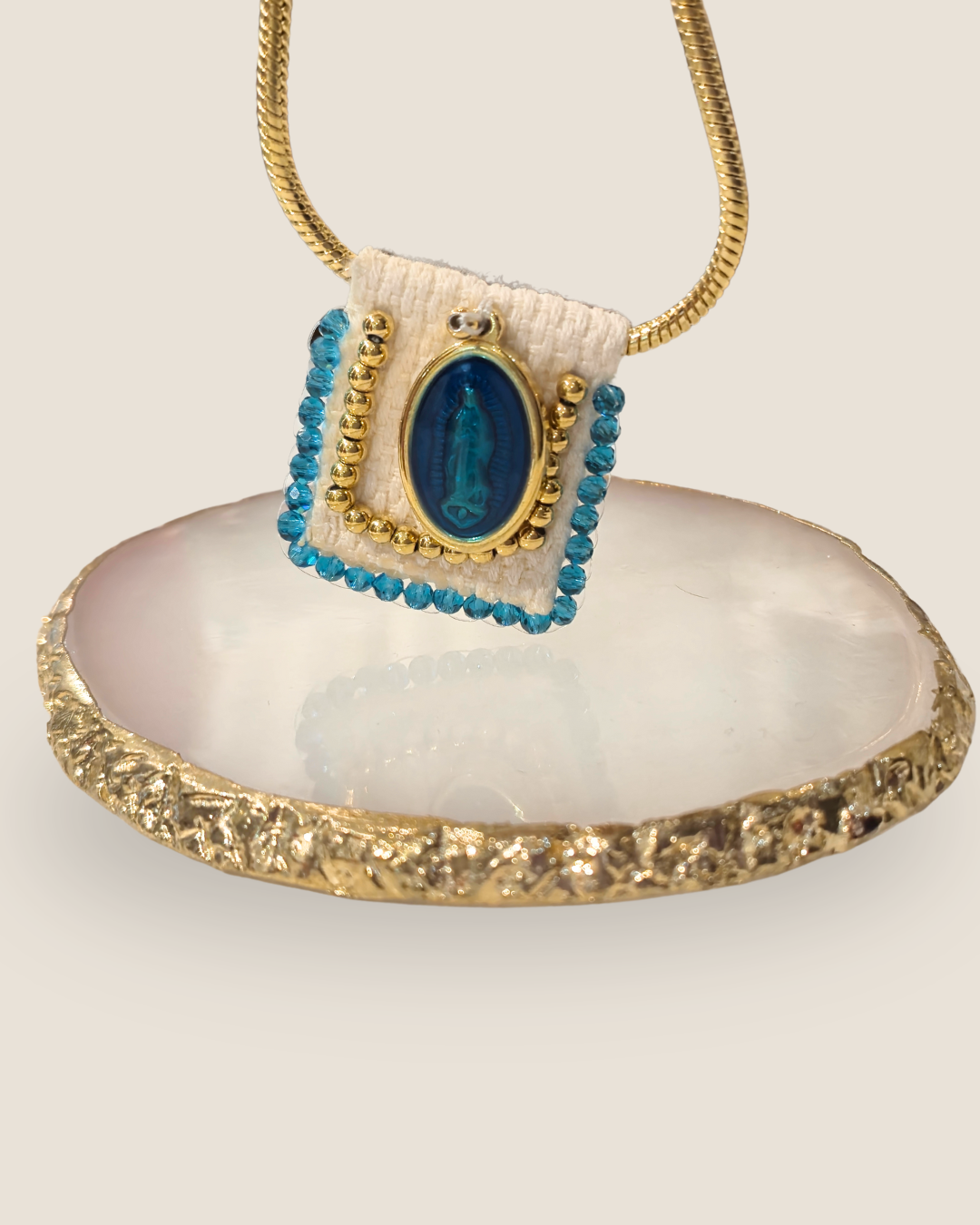 Pulsera celeste con diseño de virgen Maria